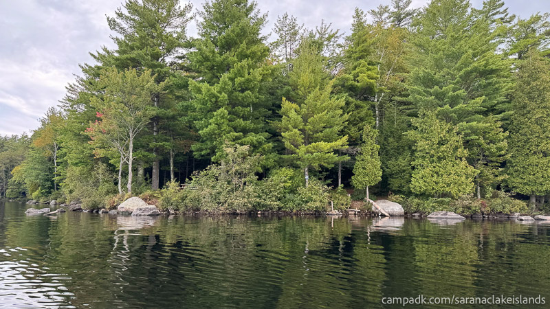 Campsite Photo of Site 47 at Saranac Lake Islands Campground, New York - View From Water on Approach