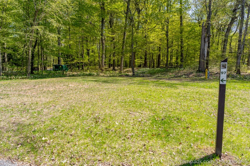 Campsite Photo of Site 97 at Selkirk Shores State Park, New York - Looking at Site from Road Sign Visible
