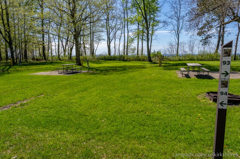 Campsite Photo of Site 94 at Selkirk Shores State Park, New York - Looking at Site from Road Sign Visible