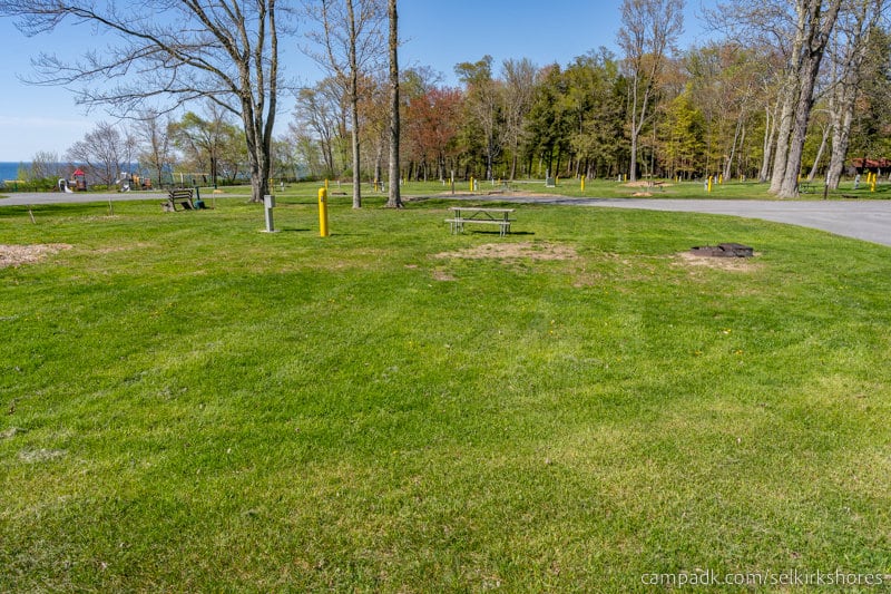 Campsite Photo of Site 82 at Selkirk Shores State Park, New York - Looking at Site from Road Sign Visible