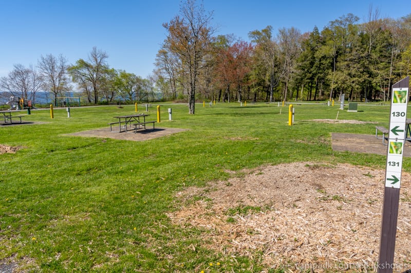 Campsite Photo of Site 130 at Selkirk Shores State Park, New York - Looking at Site from Road Sign Visible