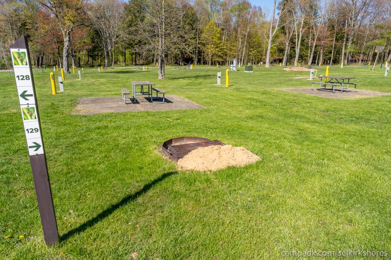 Campsite Photo of Site 129 at Selkirk Shores State Park, New York - Looking at Site from Road Sign Visible