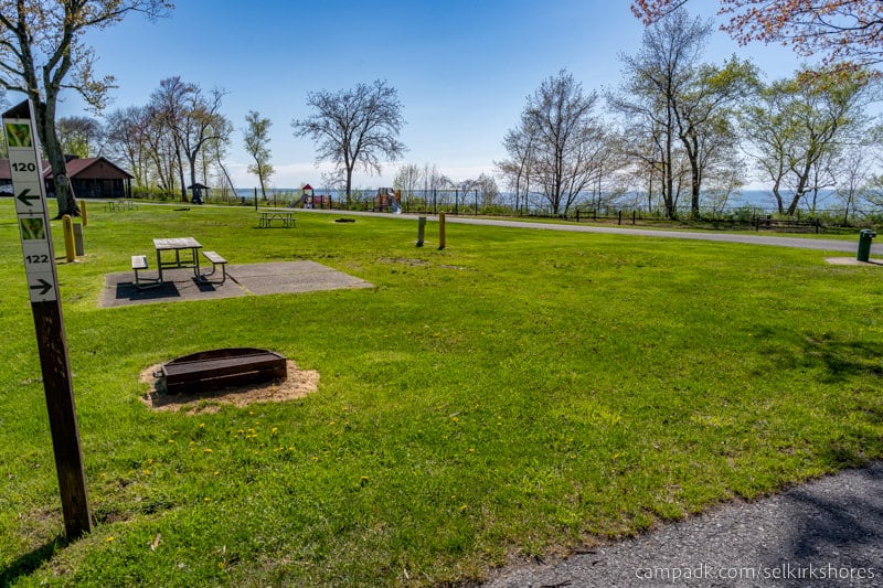 Campsite Photo of Site 122 at Selkirk Shores State Park, New York - Looking at Site from Road Sign Visible