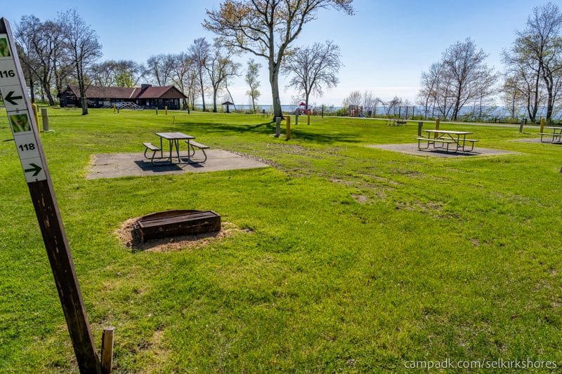 Campsite Photo of Site 118 at Selkirk Shores State Park, New York - Looking at Site from Road Sign Visible
