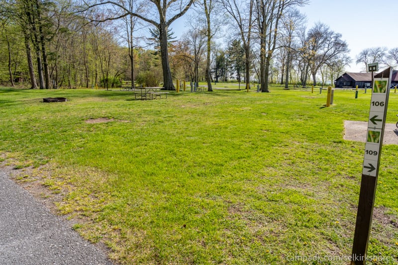 Campsite Photo of Site 106 at Selkirk Shores State Park, New York - Looking at Site from Road Sign Visible