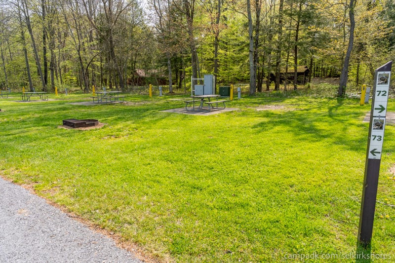 Campsite Photo of Site 73 at Selkirk Shores State Park, New York - Looking at Site from Road Sign Visible