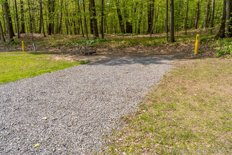 Campsite Photo of Site 48 at Selkirk Shores State Park, New York - Looking at Site from Road Sign Visible