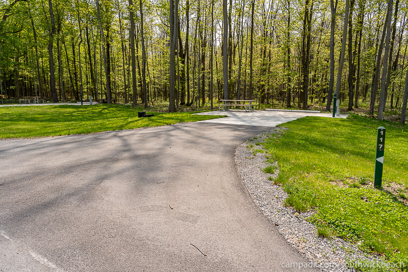 Campsite Photo of Site 117 at Southwick Beach State Park, New York - Looking at Site from Road Sign Visible