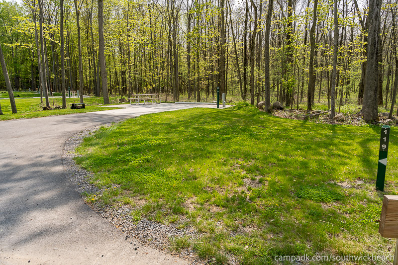 Campsite Photo of Site 119 at Southwick Beach State Park, New York - Looking at Site from Road Sign Visible