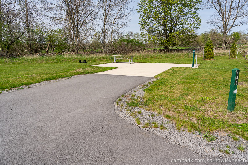 Campsite Photo of Site 124 at Southwick Beach State Park, New York - Looking at Site from Road Sign Visible