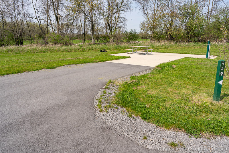 Campsite Photo of Site 126 at Southwick Beach State Park, New York - Looking at Site from Road Sign Visible