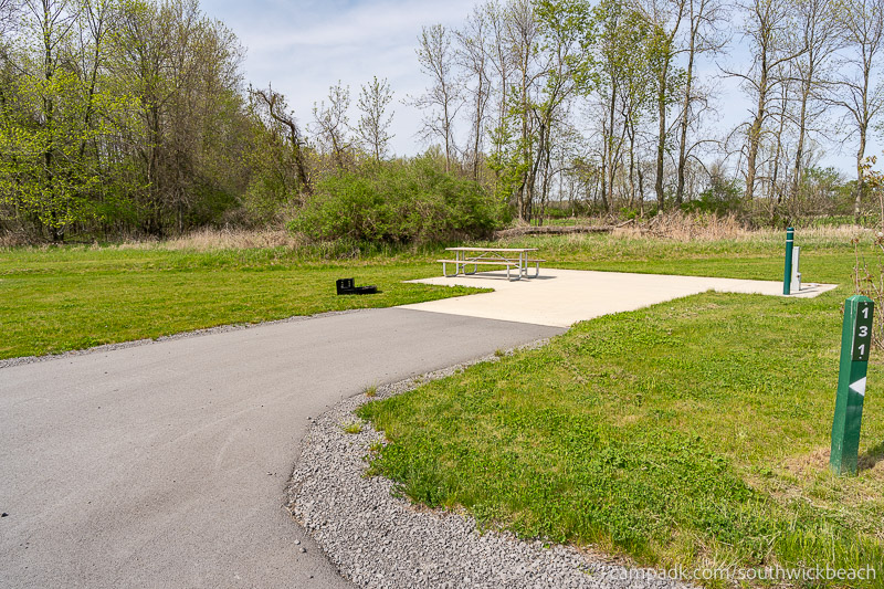 Campsite Photo of Site 131 at Southwick Beach State Park, New York - Looking at Site from Road Sign Visible