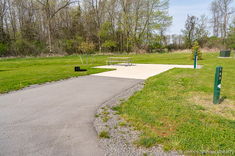 Campsite Photo of Site 133 at Southwick Beach State Park, New York - Looking at Site from Road Sign Visible