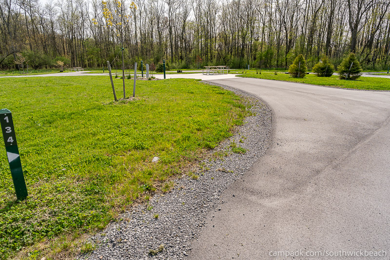 Campsite Photo of Site 134 at Southwick Beach State Park, New York - Looking at Site from Road Sign Visible