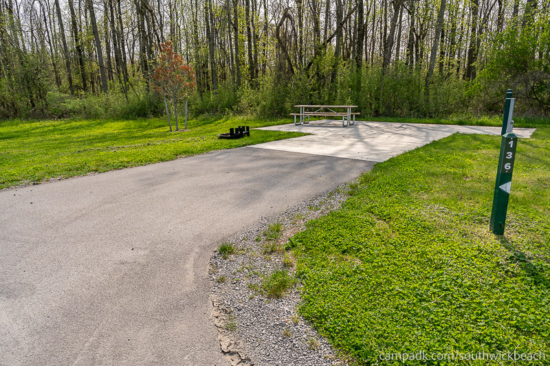 Campsite Photo of Site 136 at Southwick Beach State Park, New York - Looking at Site from Road Sign Visible