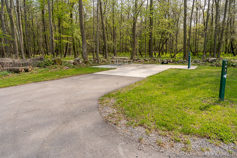 Campsite Photo of Site 141 at Southwick Beach State Park, New York - Looking at Site from Road Sign Visible