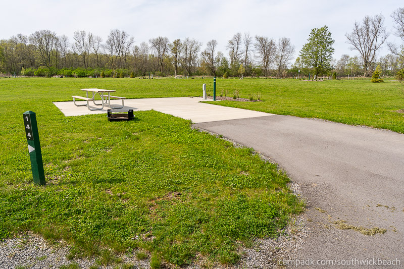 Campsite Photo of Site 144 at Southwick Beach State Park, New York - Looking at Site from Road Sign Visible