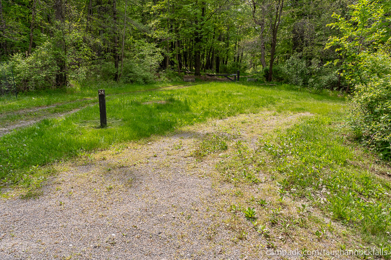 Campsite Photo of Site 24 at Taughannock Falls State Park, New York - Looking at Site from Road Sign Visible