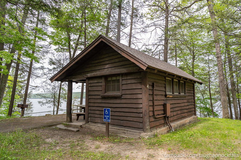 Campsite Photo of Site 4 at Taughannock Falls State Park, New York - Looking at Site from Road Sign Visible