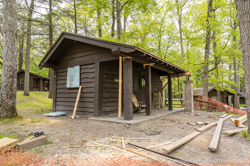 Campsite Photo of Site 16 at Taughannock Falls State Park, New York - Looking at Site from Road Sign Visible