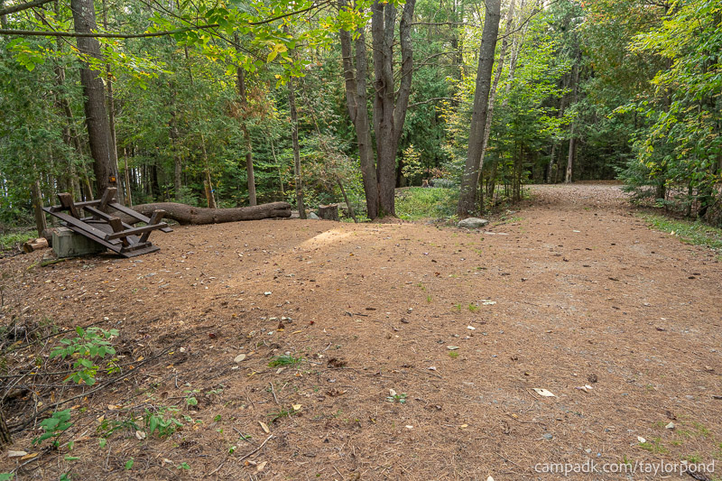 Campsite Photo of Site 14 at Taylor Pond Campground, New York - Looking at Site from Road Sign Visible