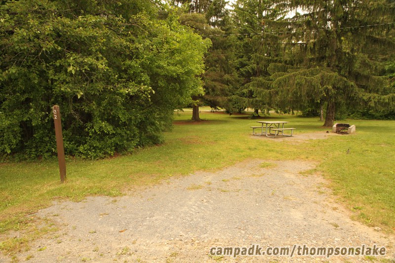 Campsite Photo of Site 22 at Thompsons Lake Campground, New York - Looking at Site from Road Sign Visible
