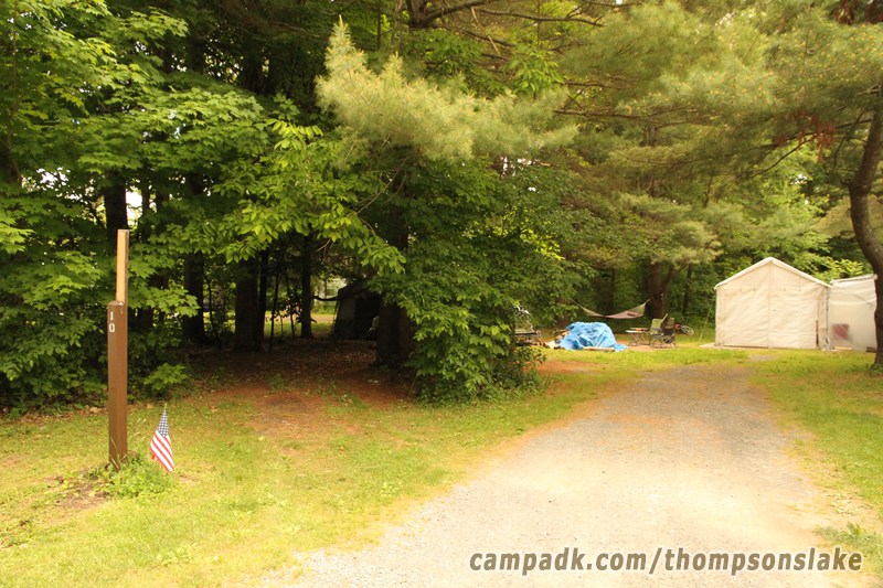 Campsite Photo of Site 10 at Thompsons Lake Campground, New York - Looking at Site from Road Sign Visible