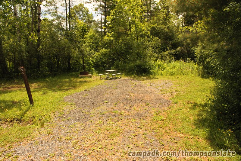 Campsite Photo of Site 93 at Thompsons Lake Campground, New York - Looking at Site from Road Sign Visible