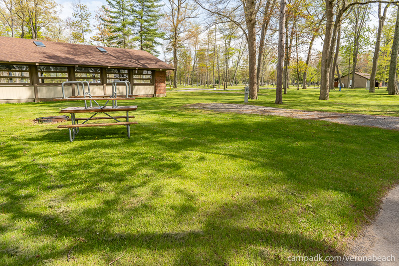 Campsite Photo of Site 13 at Verona Beach State Park, New York - Looking at Site from Road Sign Visible