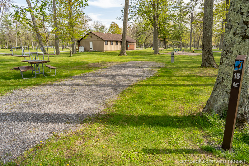 Campsite Photo of Site 15 at Verona Beach State Park, New York - Looking at Site from Road Sign Visible