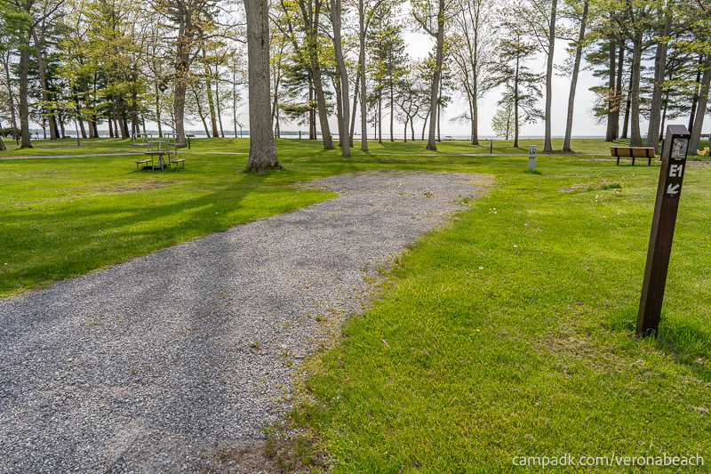Campsite Photo of Site E1 at Verona Beach State Park, New York - Looking at Site from Road Sign Visible