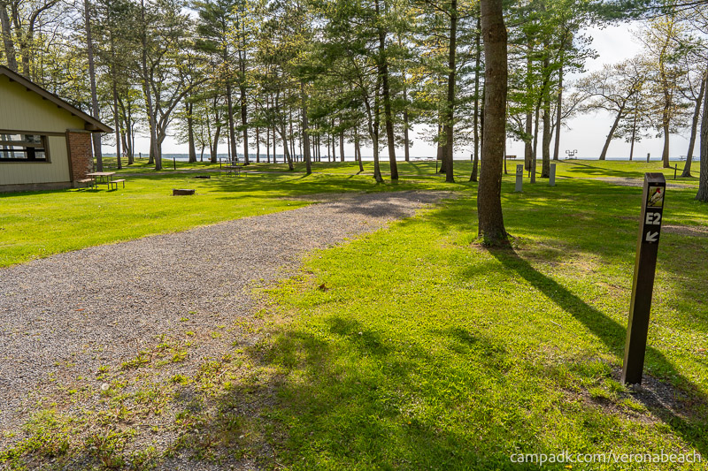 Campsite Photo of Site E2 at Verona Beach State Park, New York - Looking at Site from Road Sign Visible