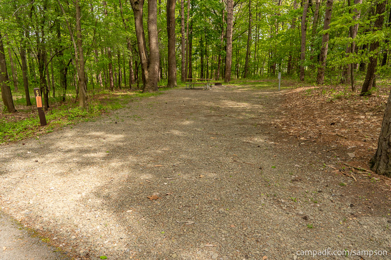 Campsite Photo of Site 62 at Watkins Glen State Park, New York - Looking at Site from Road Sign Visible