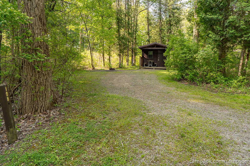 Campsite Photo of Site 108 at Watkins Glen State Park, New York - Looking at Site from Road Sign Visible