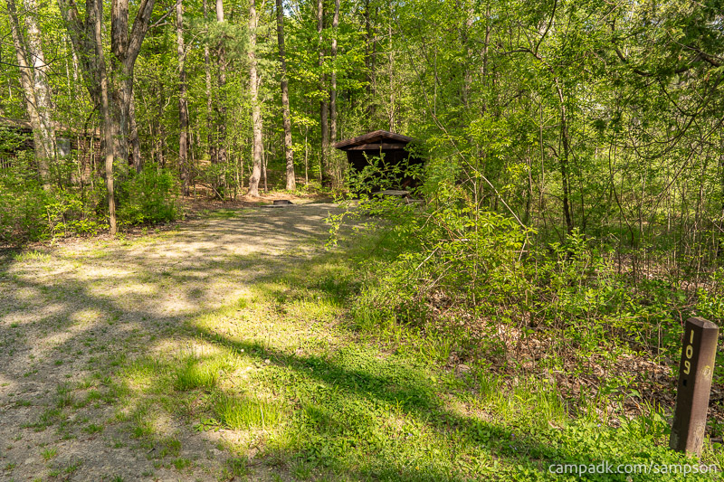Campsite Photo of Site 109 at Watkins Glen State Park, New York - Looking at Site from Road Sign Visible