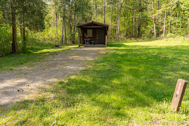 Campsite Photo of Site 118 at Watkins Glen State Park, New York - Looking at Site from Road Sign Visible