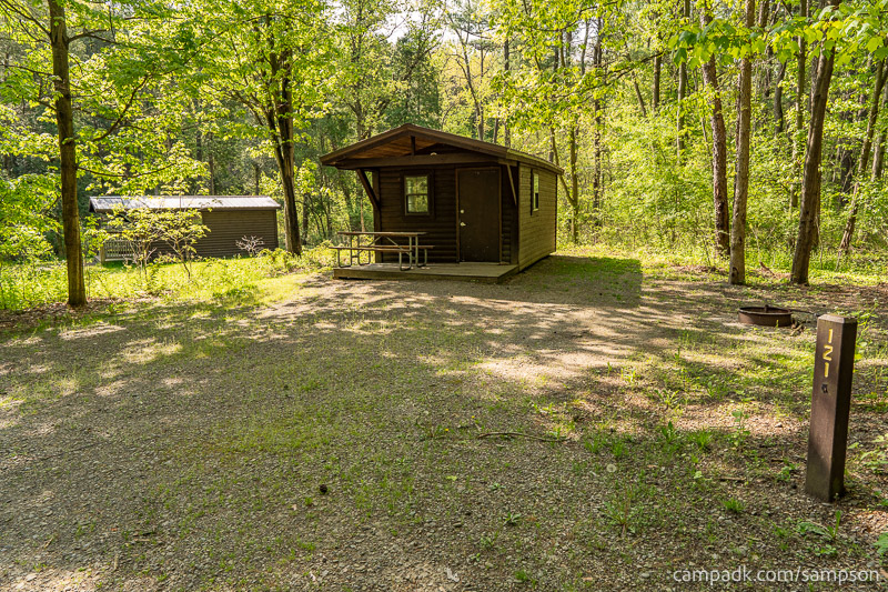 Campsite Photo of Site 121 at Watkins Glen State Park, New York - Looking at Site from Road Sign Visible
