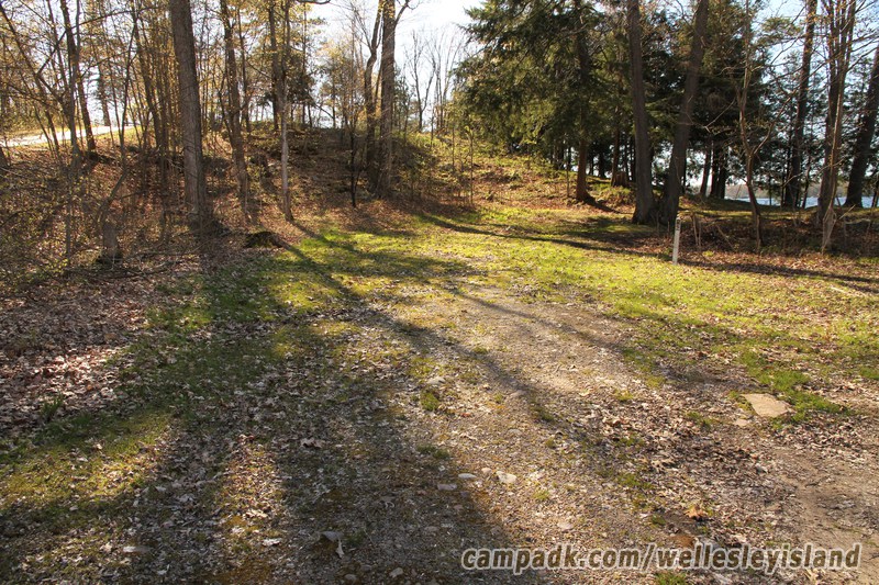 Campsite Photo of Site 2 at Wellesley Island State Park, New York - Looking at Site from Road Sign Visible