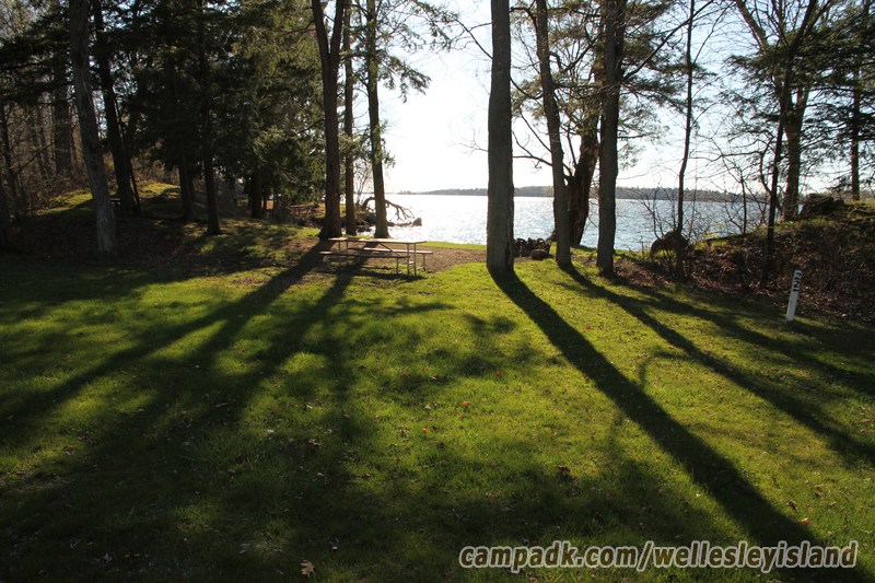 Campsite Photo of Site 22 at Wellesley Island State Park, New York - Looking at Site from Road Sign Visible