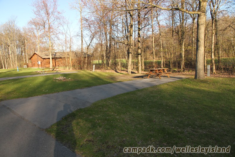 Campsite Photo of Site 39 at Wellesley Island State Park, New York - Looking at Site from Road Sign Visible