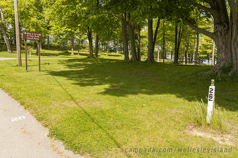 Campsite Photo of Site 26 at Wellesley Island State Park, New York - Looking at Site from Road Sign Visible