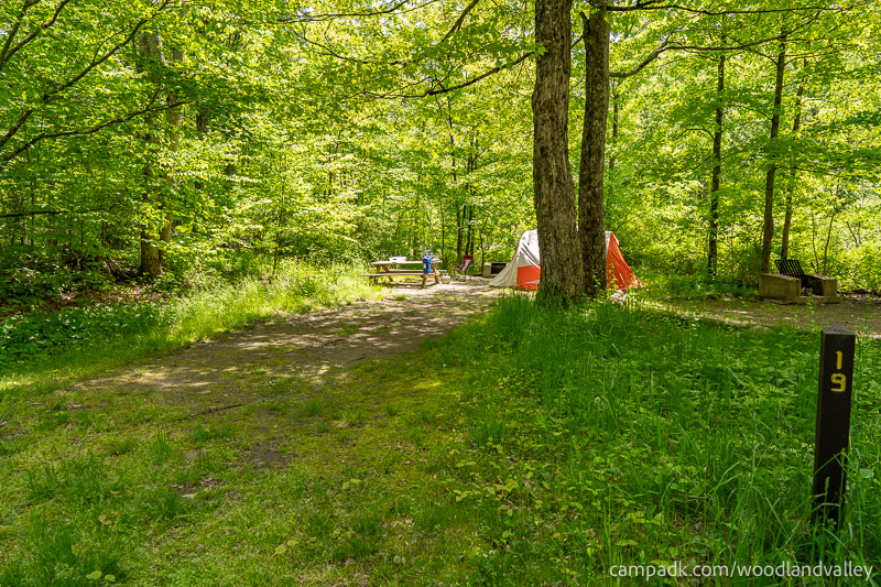 Campsite Photo of Site 19 at Woodland Valley Campground, New York - Looking at Site from Road Sign Visible